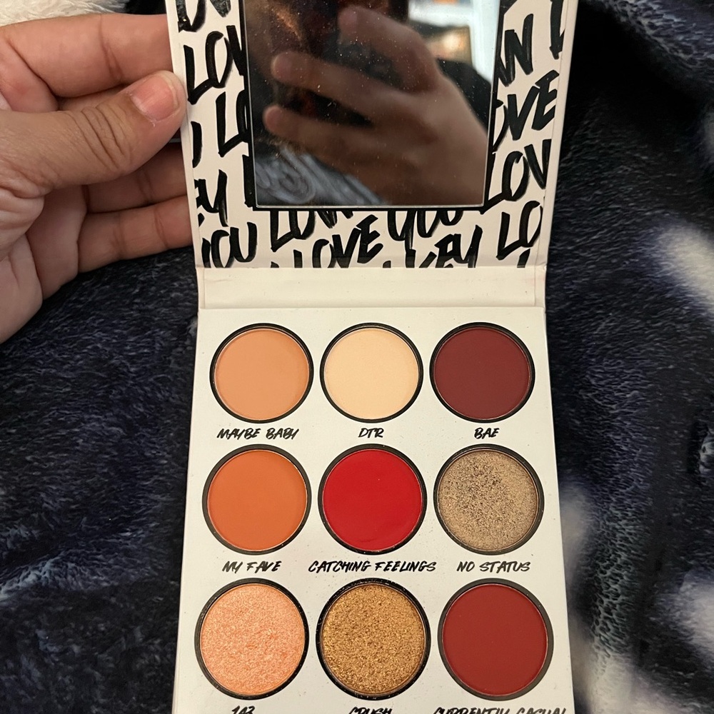 Cream and Red Eyeshadow Palette with Matte and Shimmer Finishes